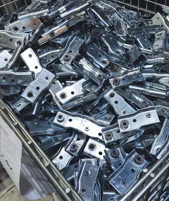 Parti metalliche di produzione