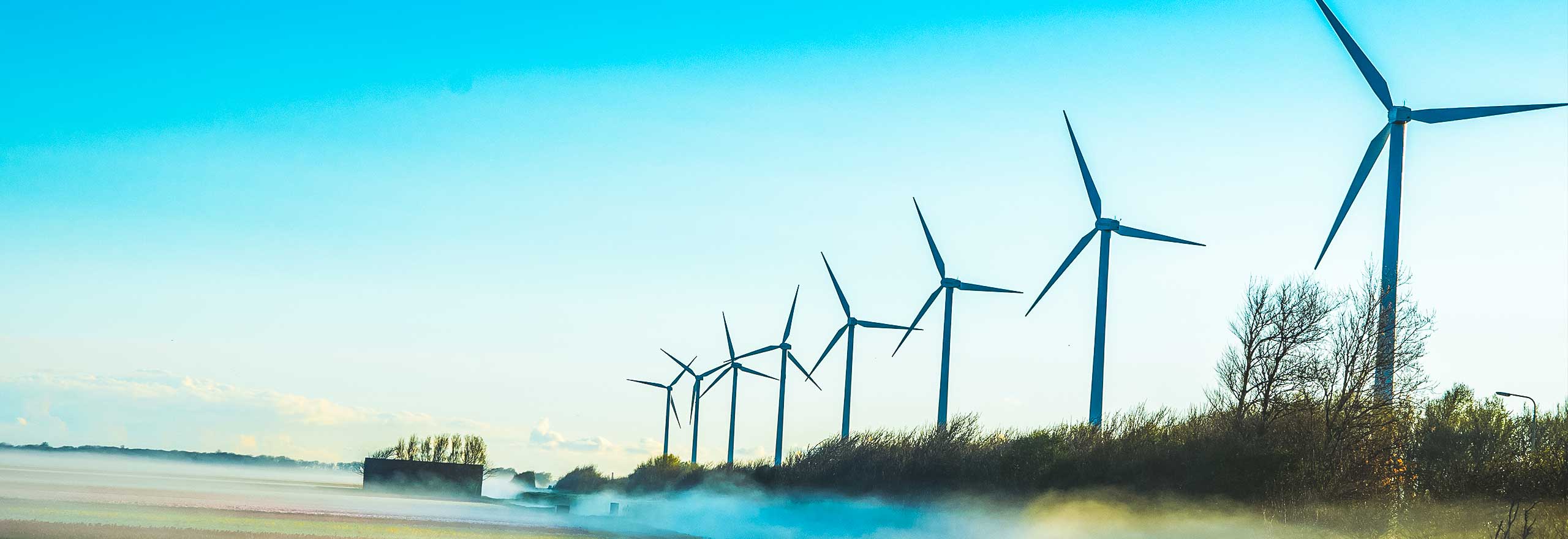 Large windmills across a landscape