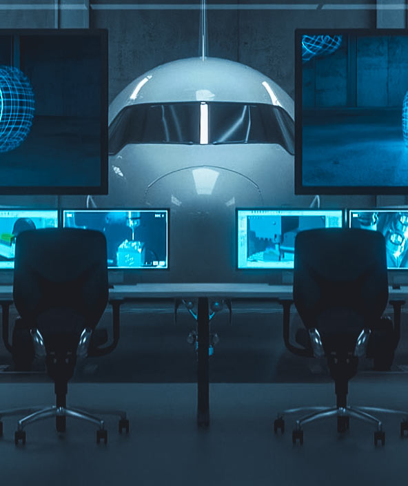 A computer room facing an aircraft hangar with a plan inside
